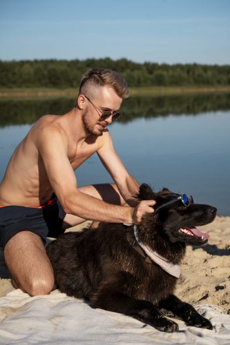August Man Hanging with his Dog